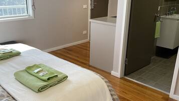 Premium Queen Room | 1 bedroom, premium bedding, pillow-top beds, blackout curtains