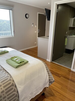 Premium Queen Room | 1 bedroom, premium bedding, pillow-top beds, blackout curtains