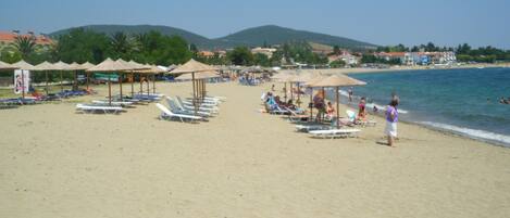 Private beach nearby, 2 beach bars