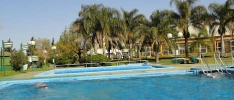 Seasonal outdoor pool, pool loungers