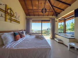 Suite Deluxe, 1 letto matrimoniale, idromassaggio, vista oceano | Una cassaforte in camera, Wi-Fi gratuito, lenzuola