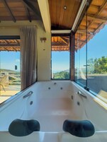 Suite Deluxe, 1 letto matrimoniale, idromassaggio, vista oceano | Una cassaforte in camera, Wi-Fi gratuito, lenzuola