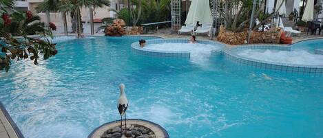 Indoor pool, open 7:30 AM to 7:30 PM, pool umbrellas, sun loungers