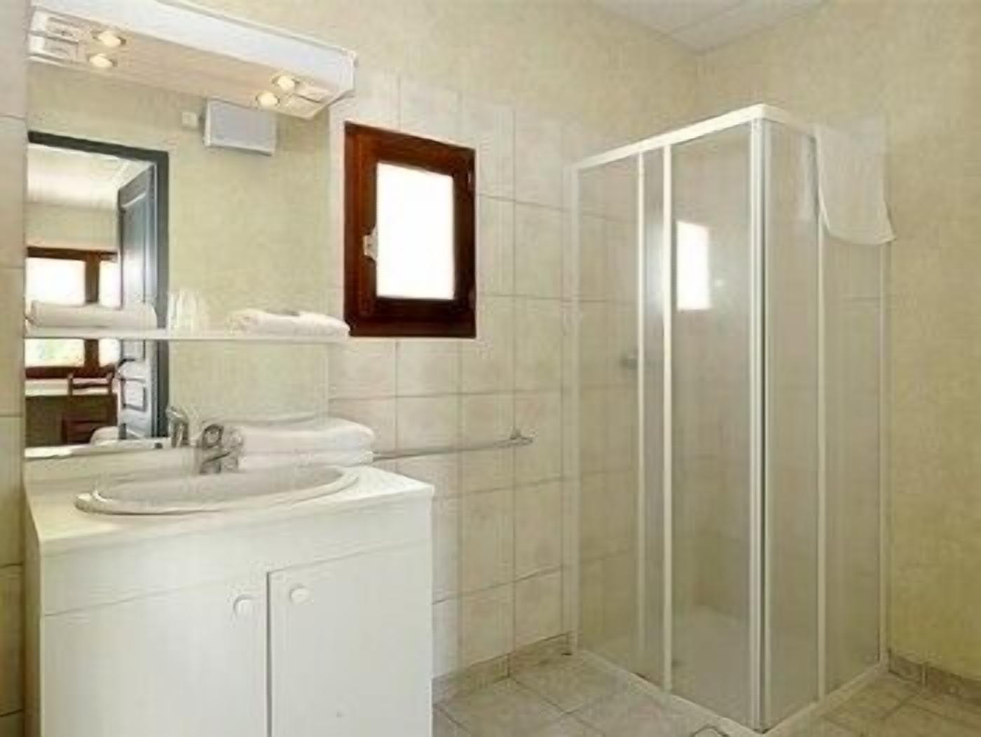 double room street view | bathroom | free toiletries, hair dryer, towels