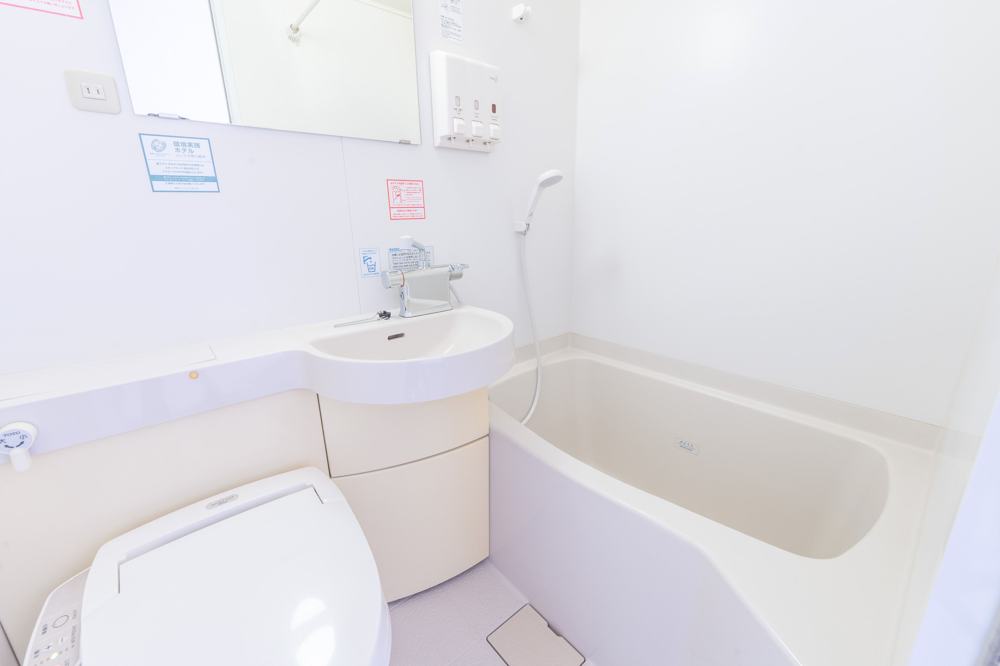 Combined shower/tub, free toiletries, hair dryer, slippers