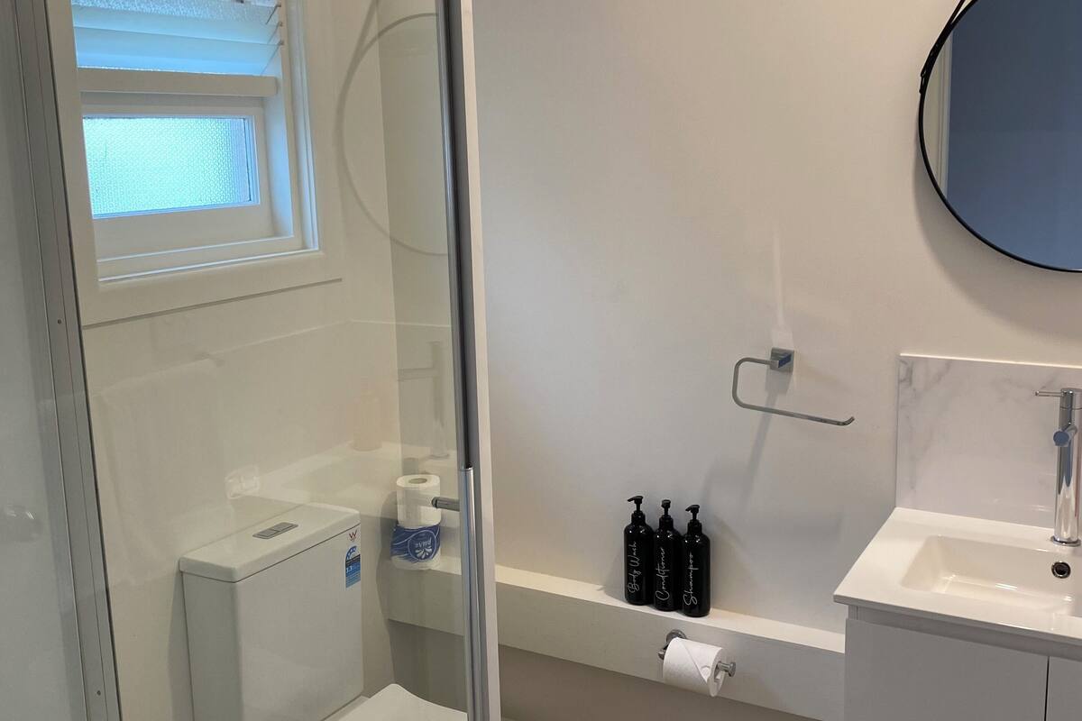 motel suite | bathroom | free toiletries, hair dryer, towels, soap