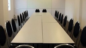 A conference room with a long table and chairs. - Tune Hotels - Kota Bharu City Centre (Kota Bharu)