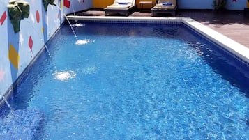 Outdoor pool, sun loungers