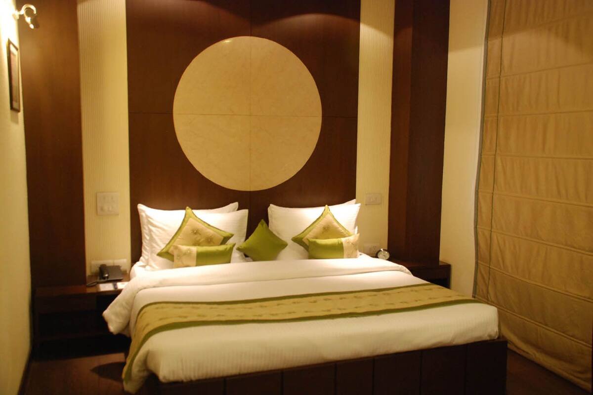 Phòng Deluxe | Bộ trải giường bằng vải cotton Ai Cập, nệm Select Comfort, minibar