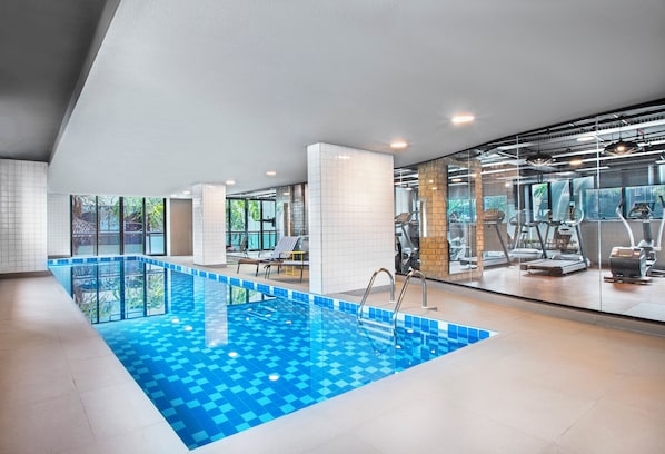Indoor pool, open 6:00 AM to 8:00 PM, pool loungers