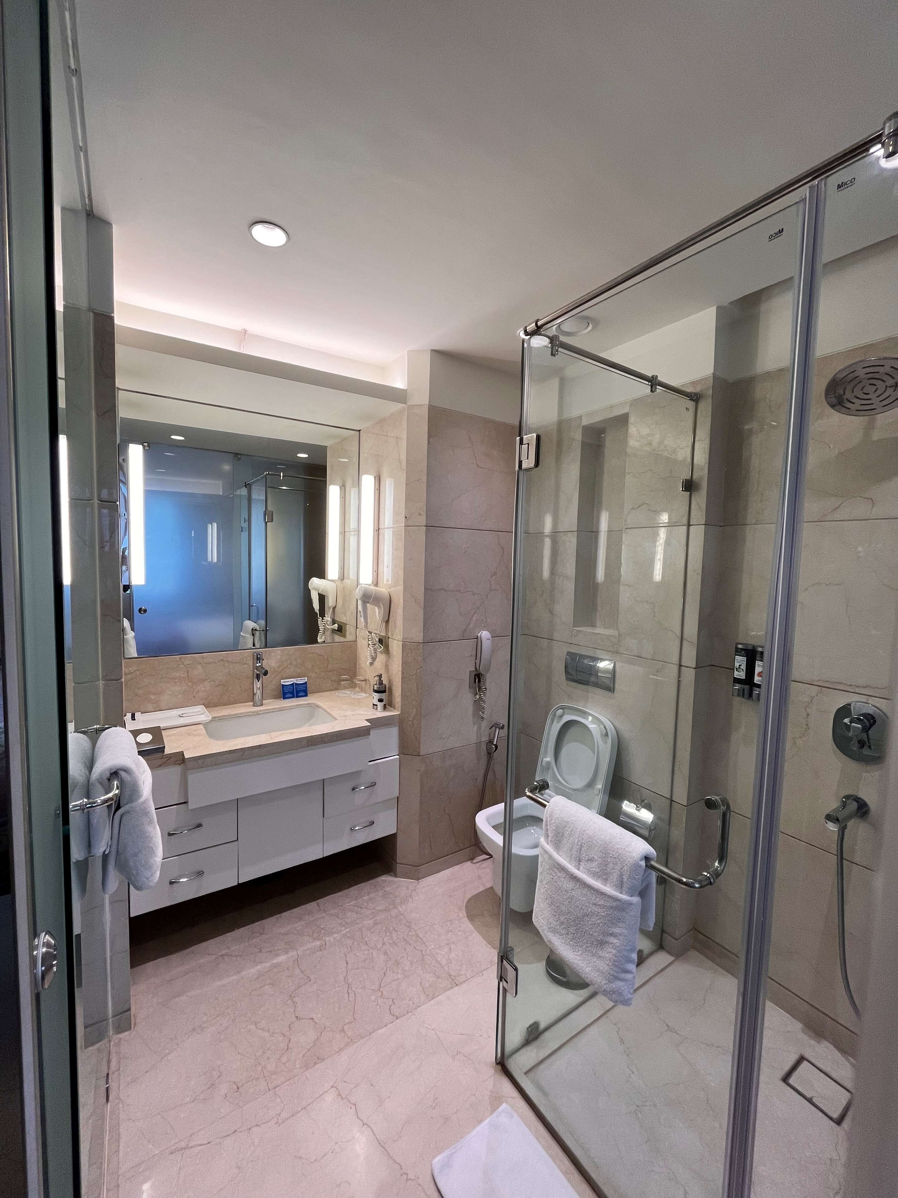 premier room, 1 double bed | bathroom | shower, free toiletries, hair dryer, bathrobes