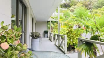 Habitación familiar, vista al jardín, en el área del jardín | Terraza o patio