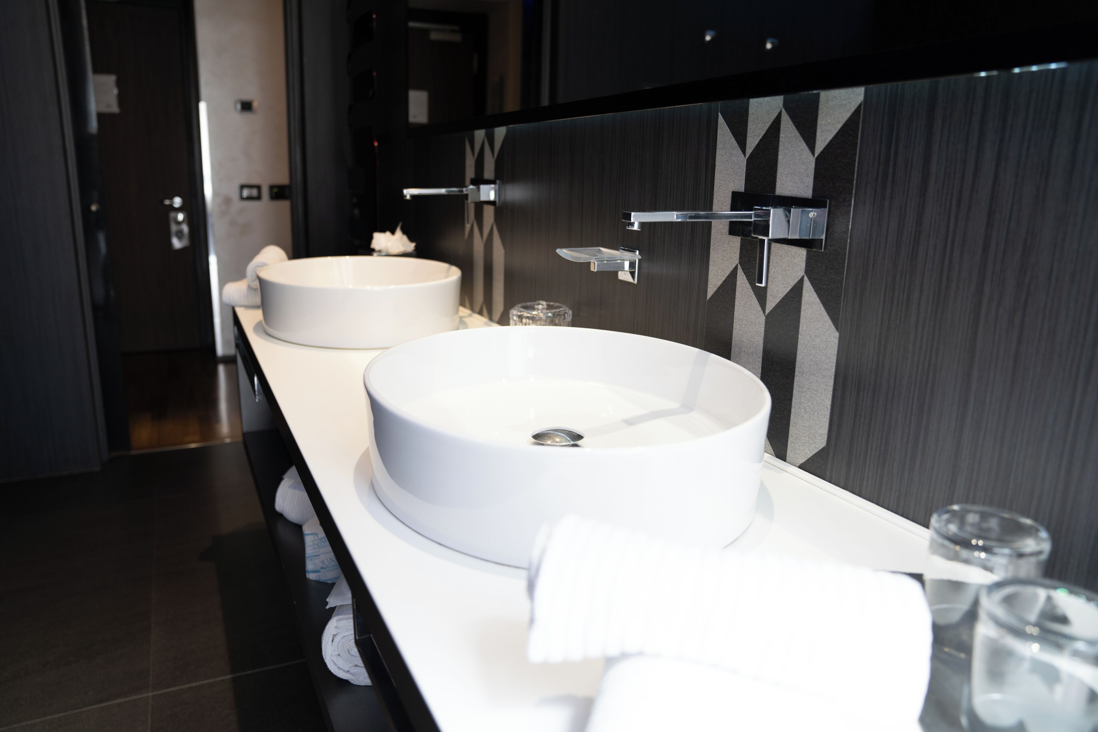 deluxe double room | bathroom | designer toiletries, hair dryer, slippers, bidet