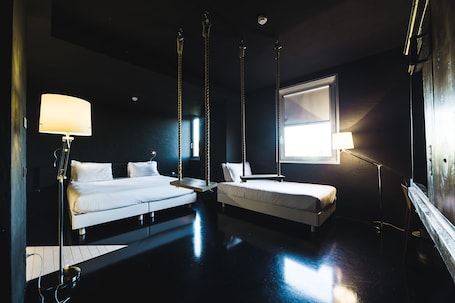 Hypo-allergenic bedding, down comforters, minibar, in-room safe