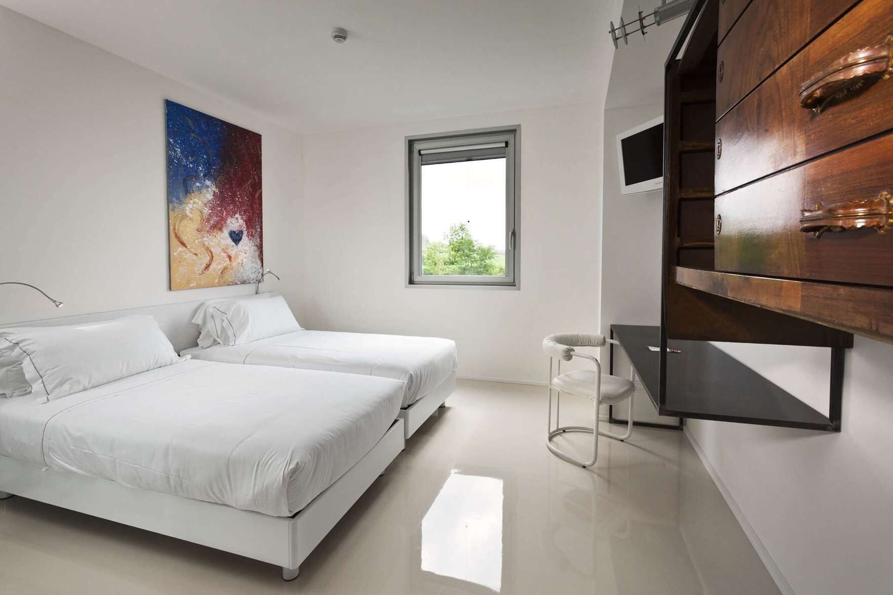 Hypo-allergenic bedding, down duvets, minibar, in-room safe
