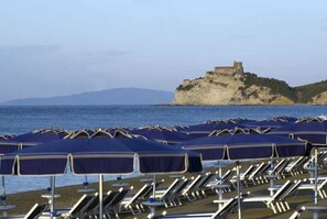 Sun loungers, beach umbrellas, beach bar