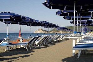 Sun loungers, beach umbrellas, beach bar