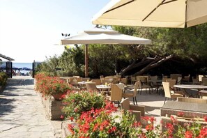 Sun loungers, beach umbrellas, beach bar