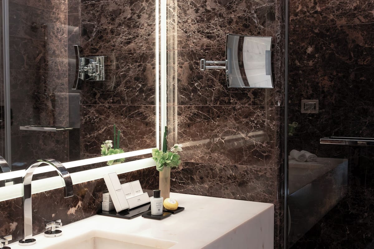 spa suite view | bathroom | rainfall showerhead, free toiletries, hair dryer, bathrobes