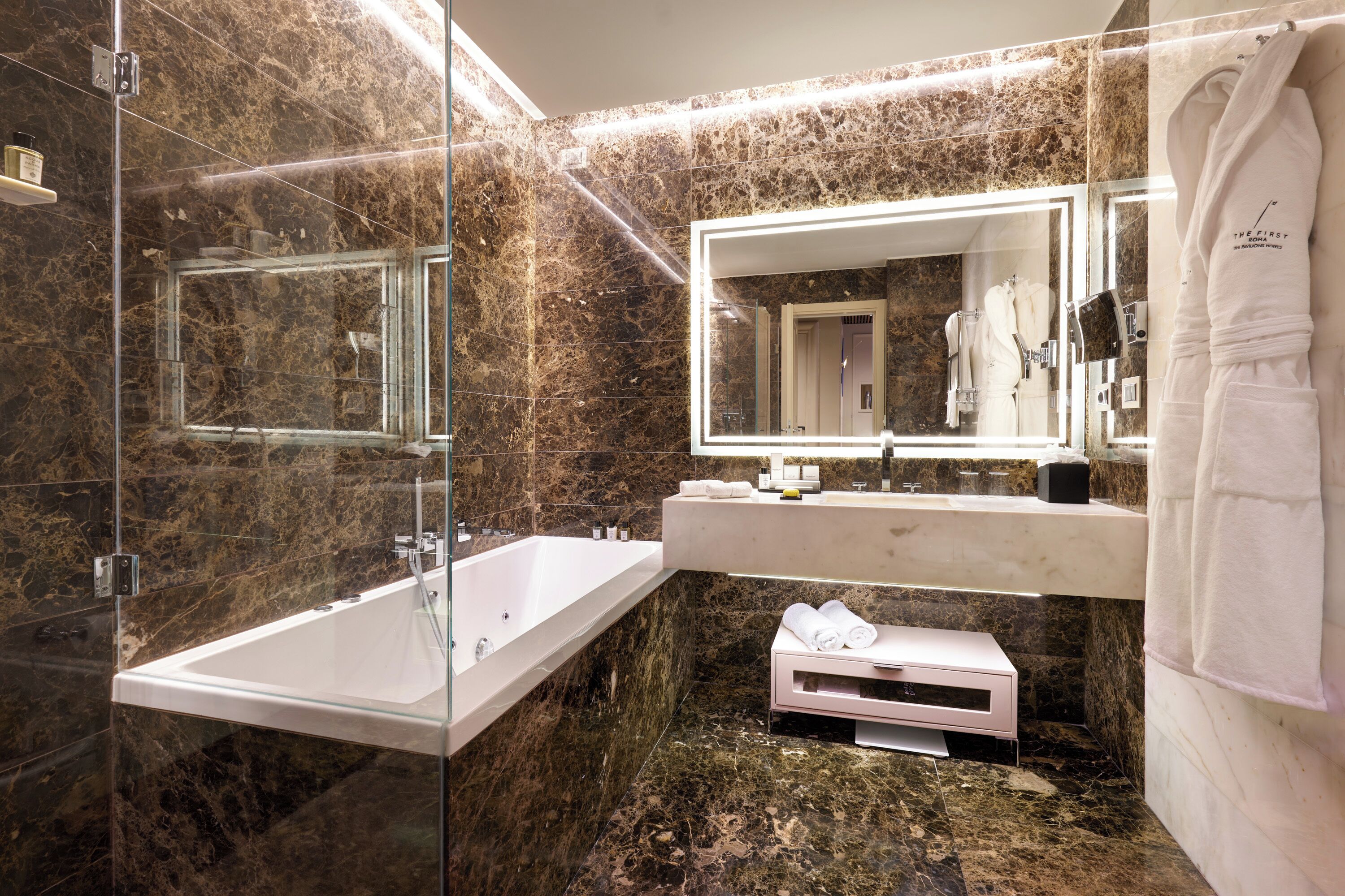 suite (first) | bathroom | rainfall showerhead, free toiletries, hair dryer, bathrobes