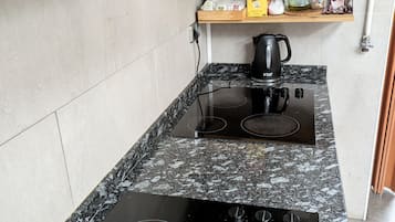 Fridge, microwave, toaster, cookware/dishes/utensils