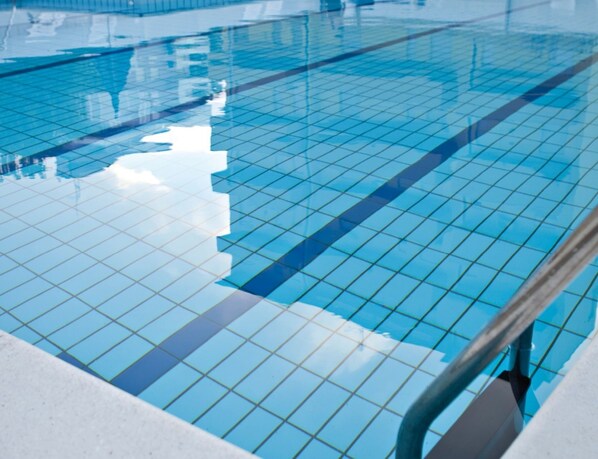 Seasonal outdoor pool, pool umbrellas, pool loungers