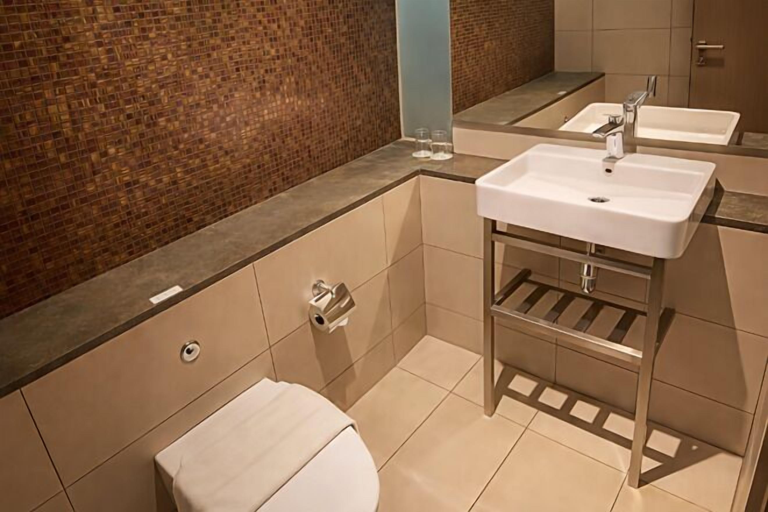 Free toiletries, hair dryer, slippers, bidet