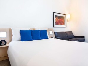 Superior Queen Room with Sofa Bed | Minibar, in-room safe, individually decorated, desk