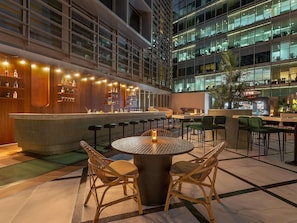 Poolside views, serves lunch, dinner and happy hour