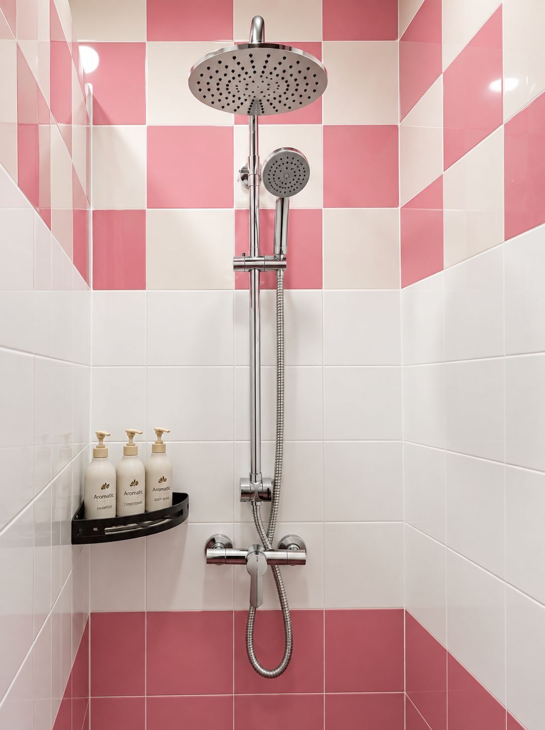 A shower with a rain showerhead and handheld showerhead, a black shelf with three bottles of shampoo, and a tiled wall with a pink and white pattern.