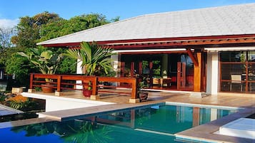 Outdoor pool, pool umbrellas, sun loungers