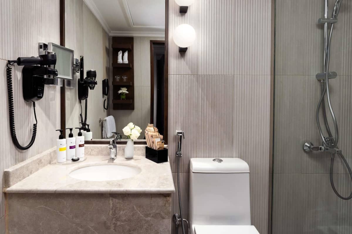 Eco-friendly toiletries, hair dryer, bathrobes, towels