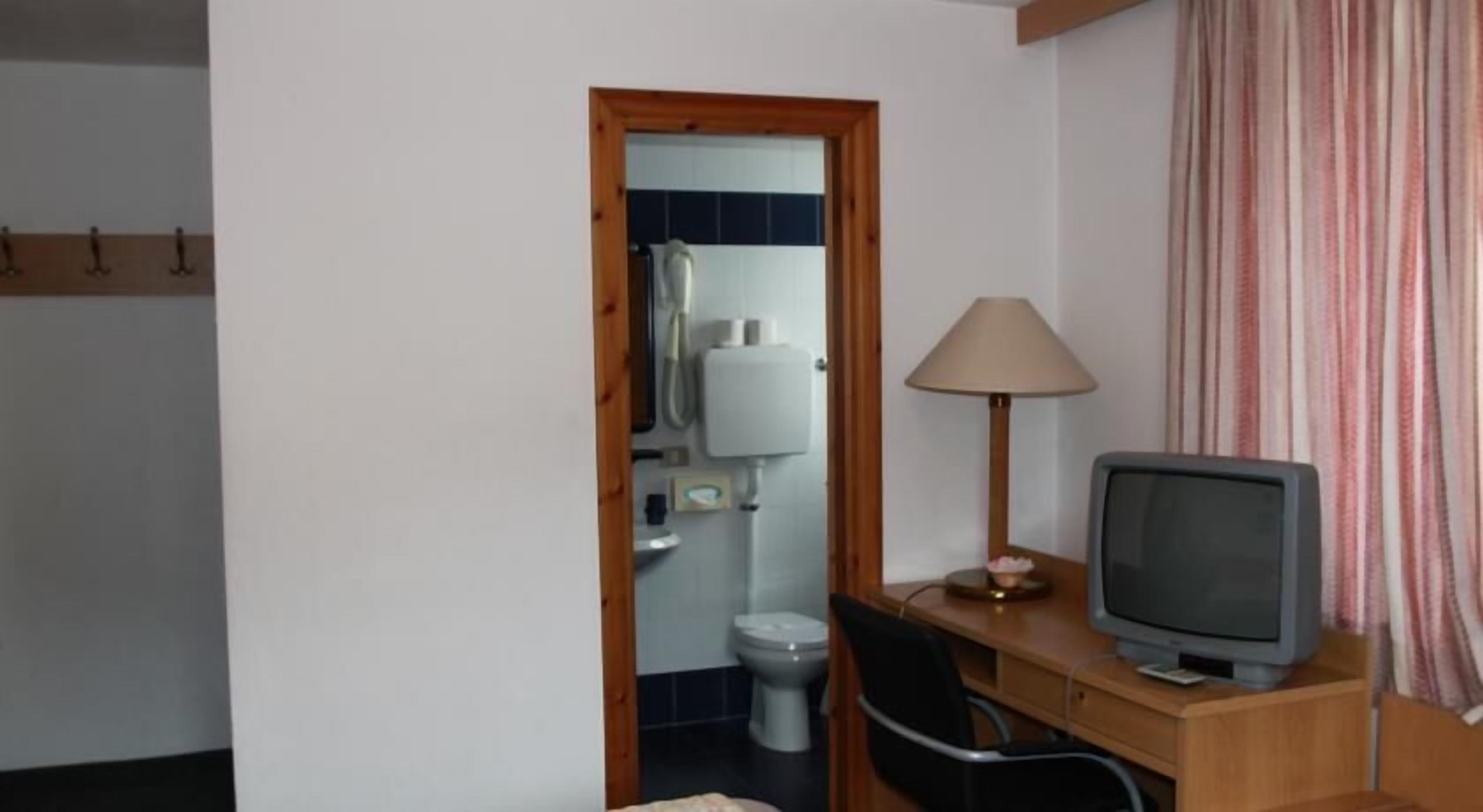 standard double room | frette italian sheets, premium bedding, desk, free cots/infant beds