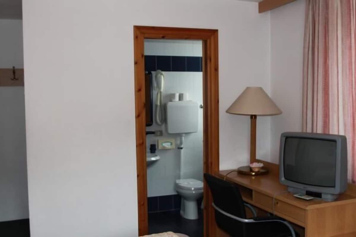 standard double room | frette italian sheets, premium bedding, desk, free cots/infant beds