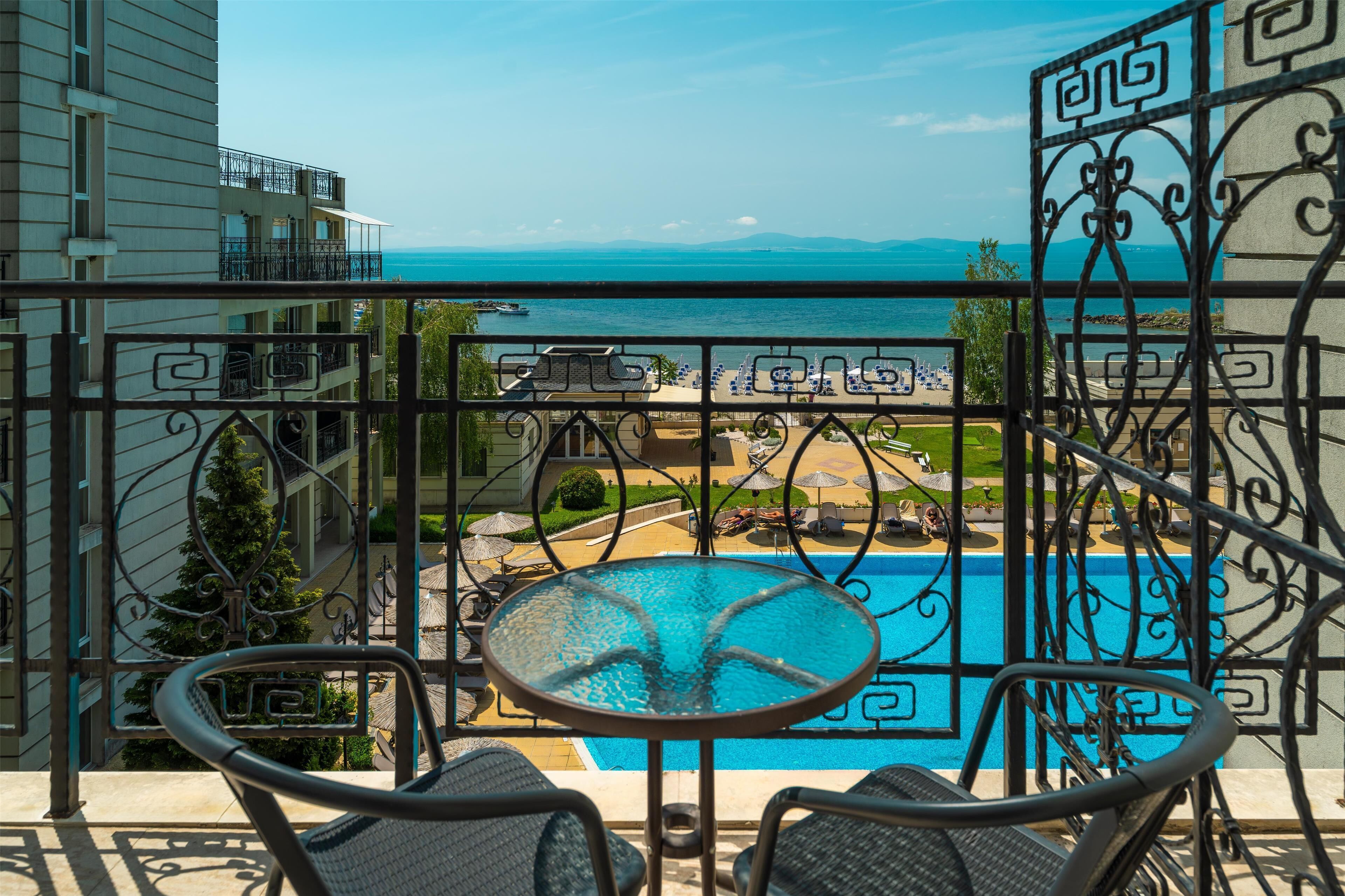 Suite, Sea View | Minibar, desk, iron/ironing board, free WiFi