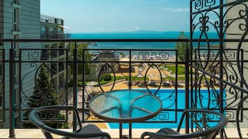 Suite, Sea View | Minibar, desk, iron/ironing board, free WiFi