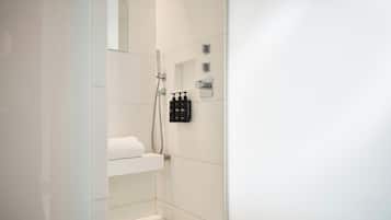Superior Room | Bathroom | Designer toiletries, hair dryer, bathrobes, slippers