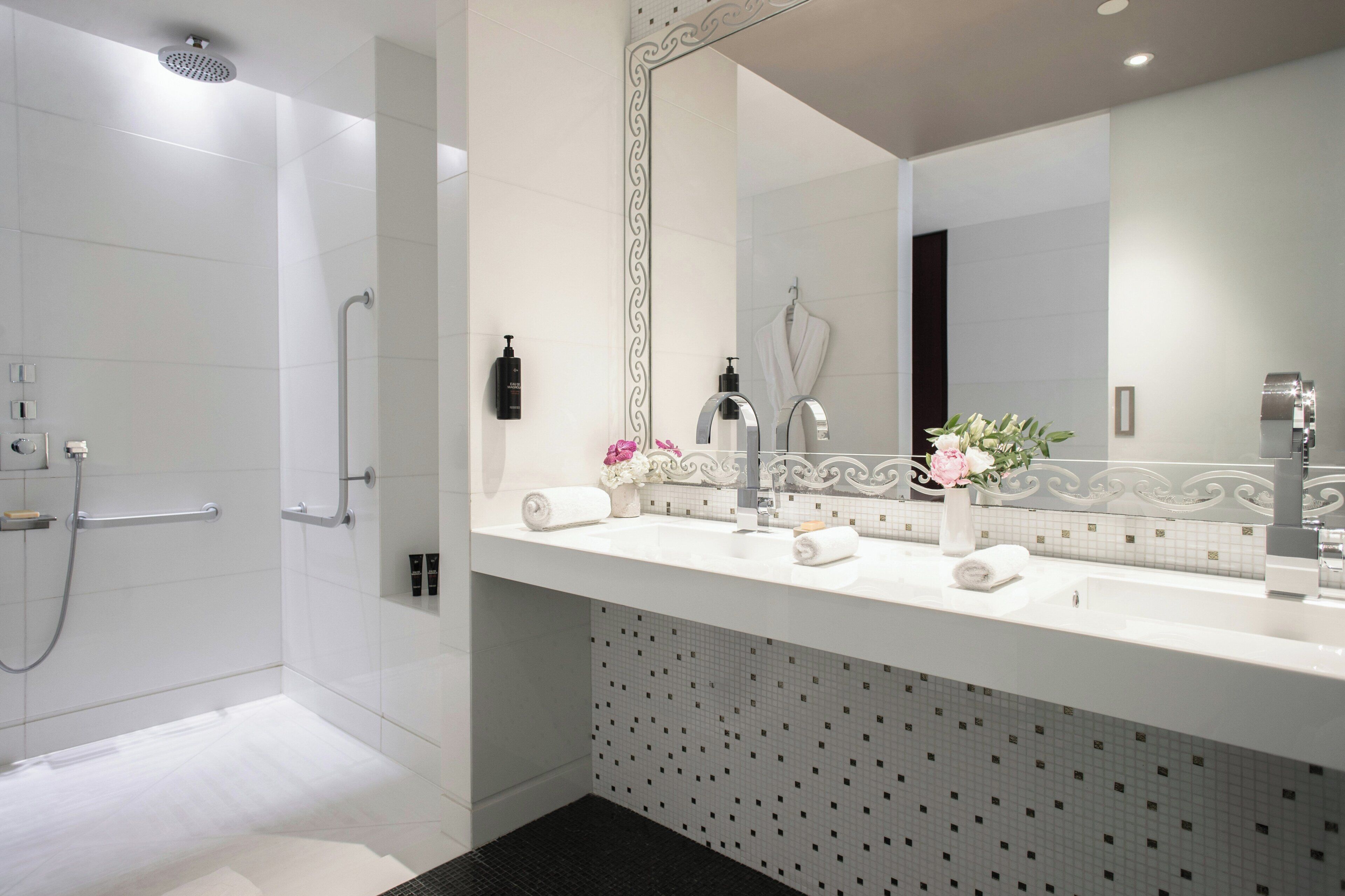 Designer toiletries, hair dryer, bathrobes, slippers