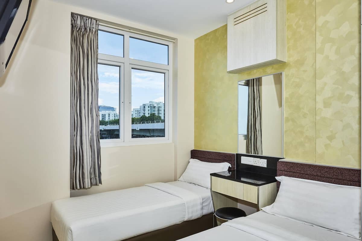 Rom – superior, 2 enkeltsenger | Skrivebord, strykejern/-brett, wi-fi (inkludert) og sengetøy