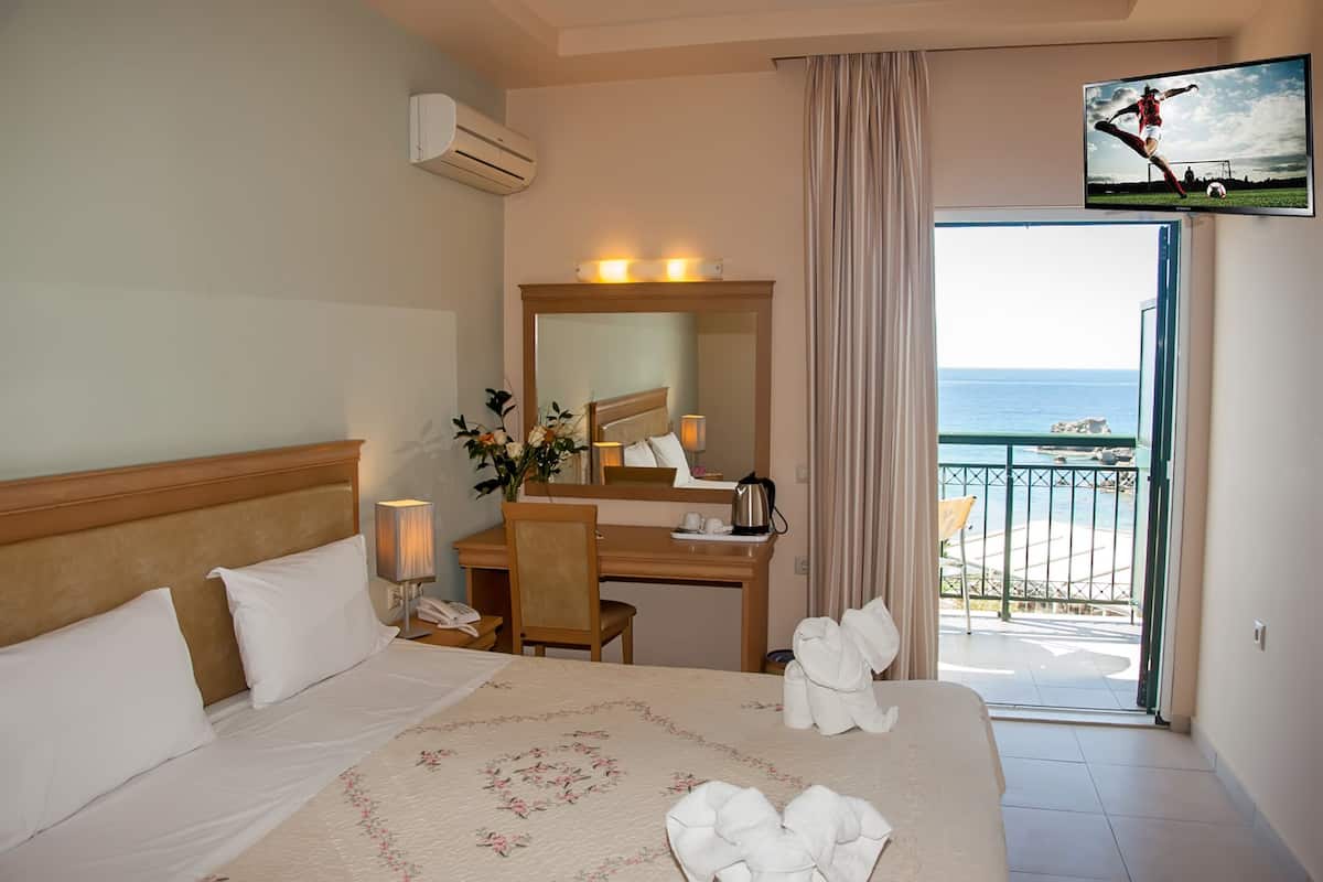 Double or Twin Room, Sea View | 1 bedroom, in-room safe, desk, blackout drapes