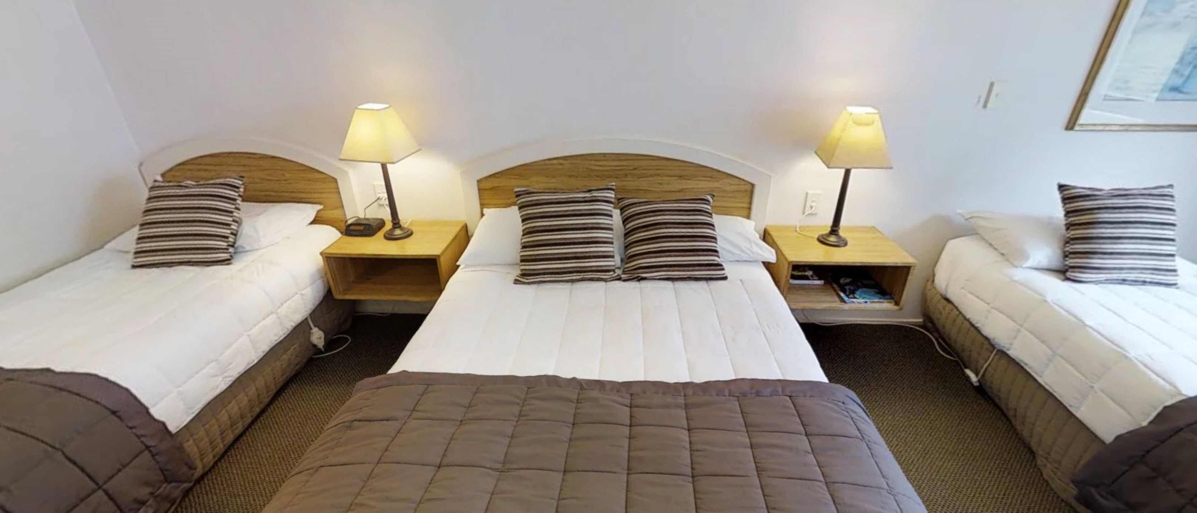 Premium bedding, Select Comfort beds, desk, blackout drapes