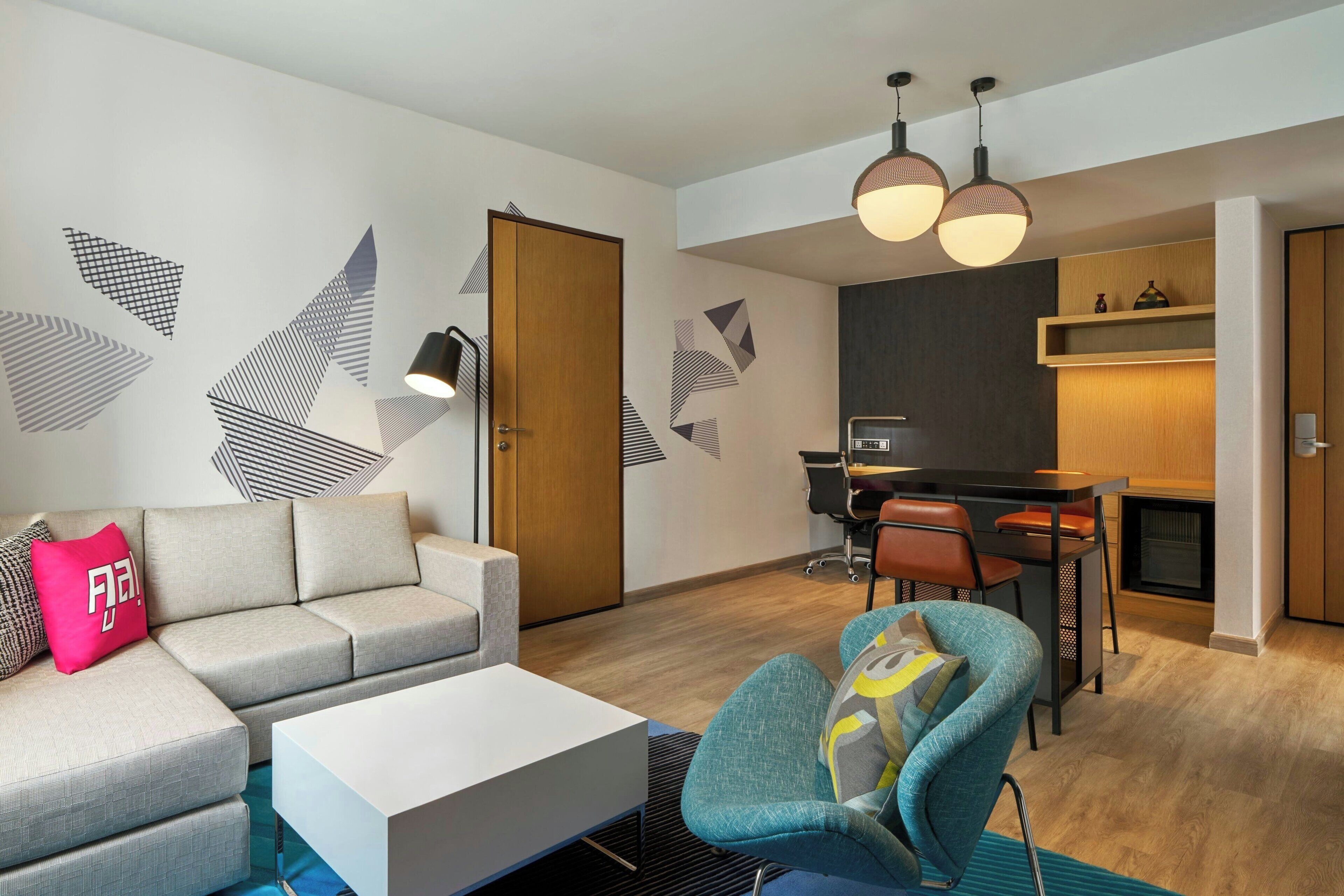 suite, 1 bedroom, non smoking (vibrant suite) | living room | 55-inch tv with satellite channels