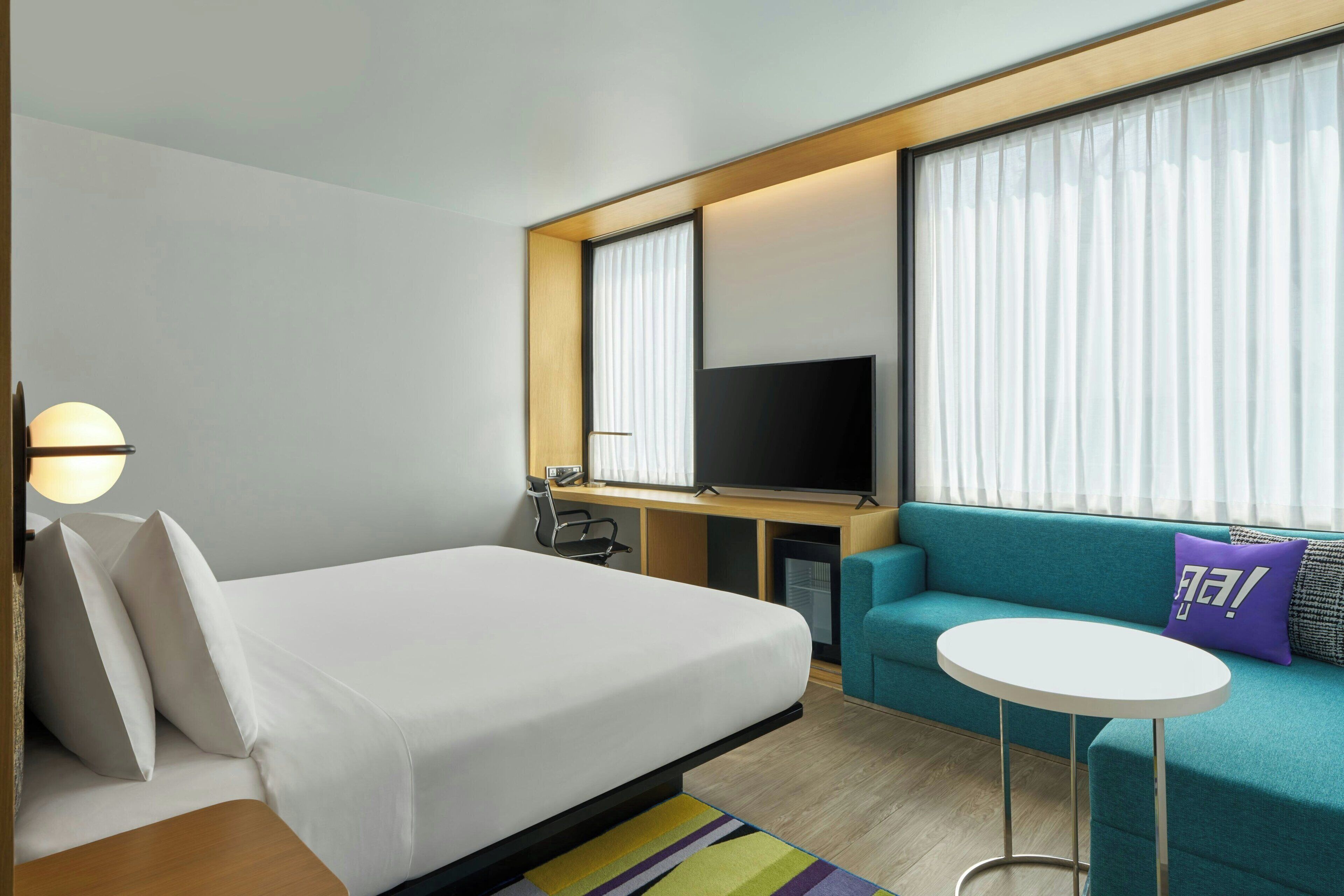 Hypo-allergenic bedding, minibar, in-room safe, desk