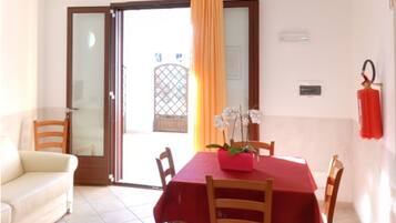 Condo (Quite Zone) | Living area | 22-inch flat-screen TV with satellite channels, TV