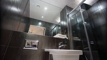 Shower, hydromassage showerhead, designer toiletries, hair dryer