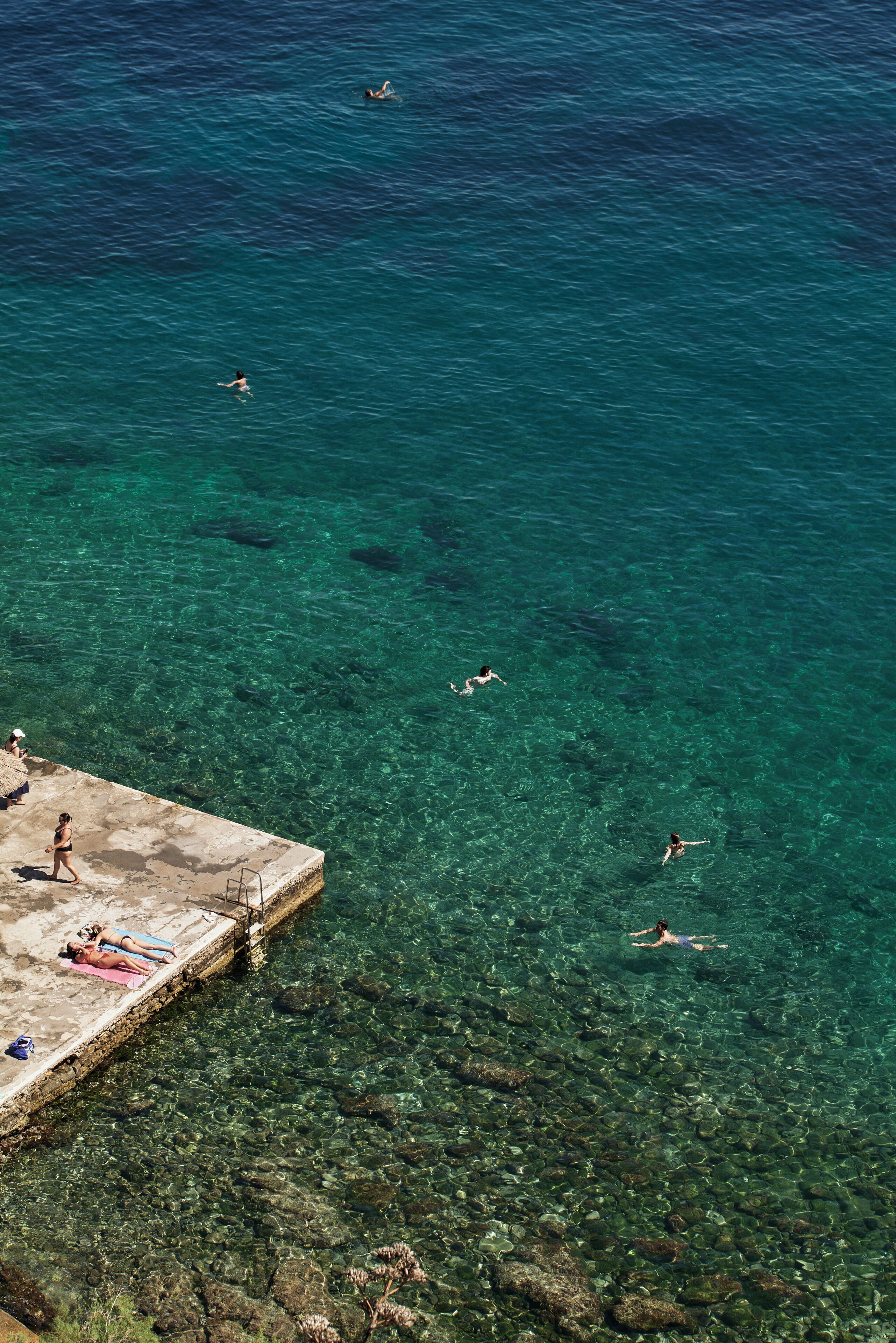 on the beach, sun-loungers, beach umbrellas, beach bar