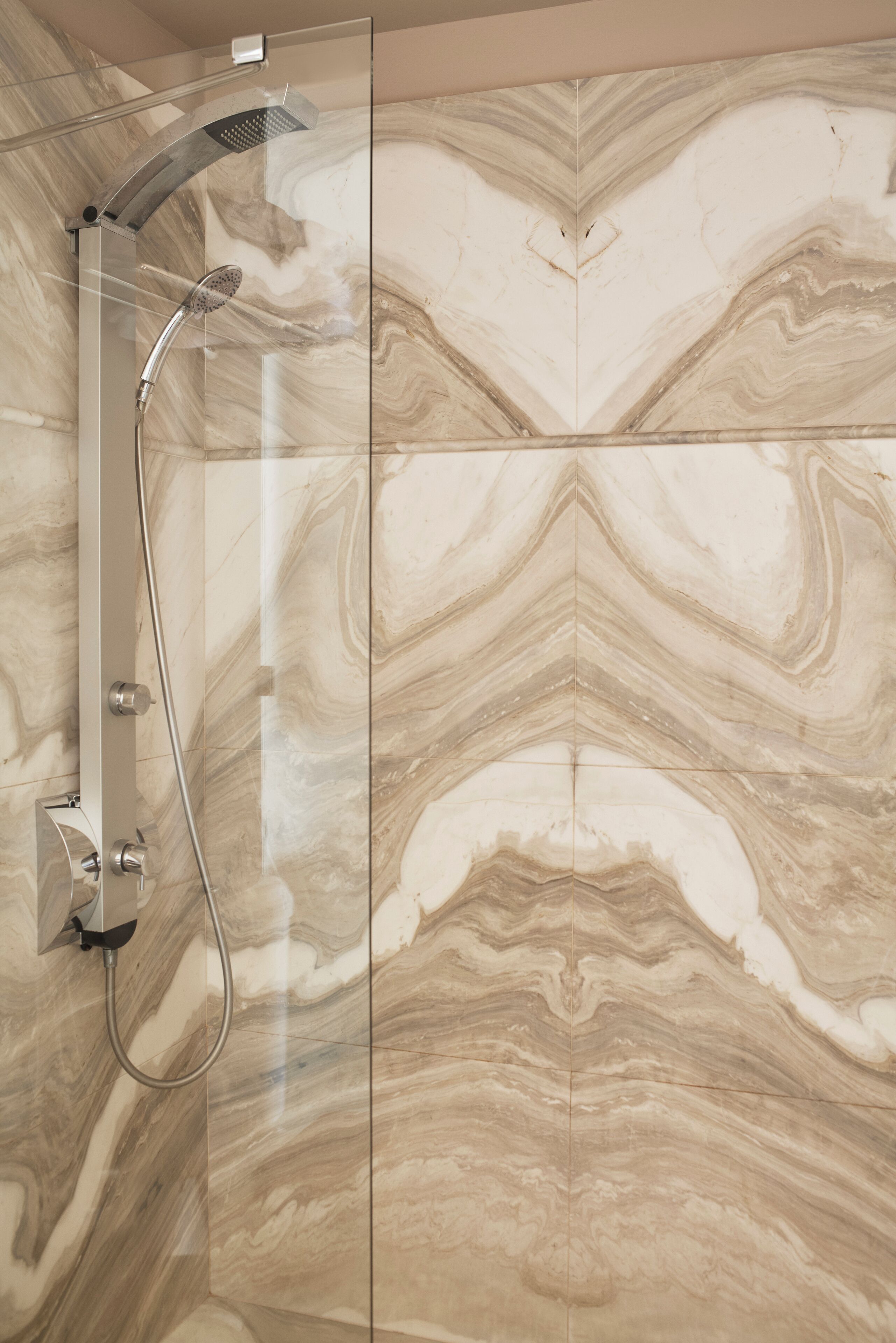 honeymoon suite sea view (main building) | bathroom | shower, free toiletries, hair dryer, slippers