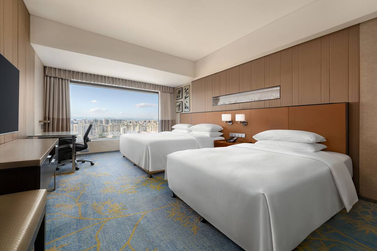 Family Room, Multiple Beds | Hypo-allergenic bedding, down duvets, minibar, in-room safe