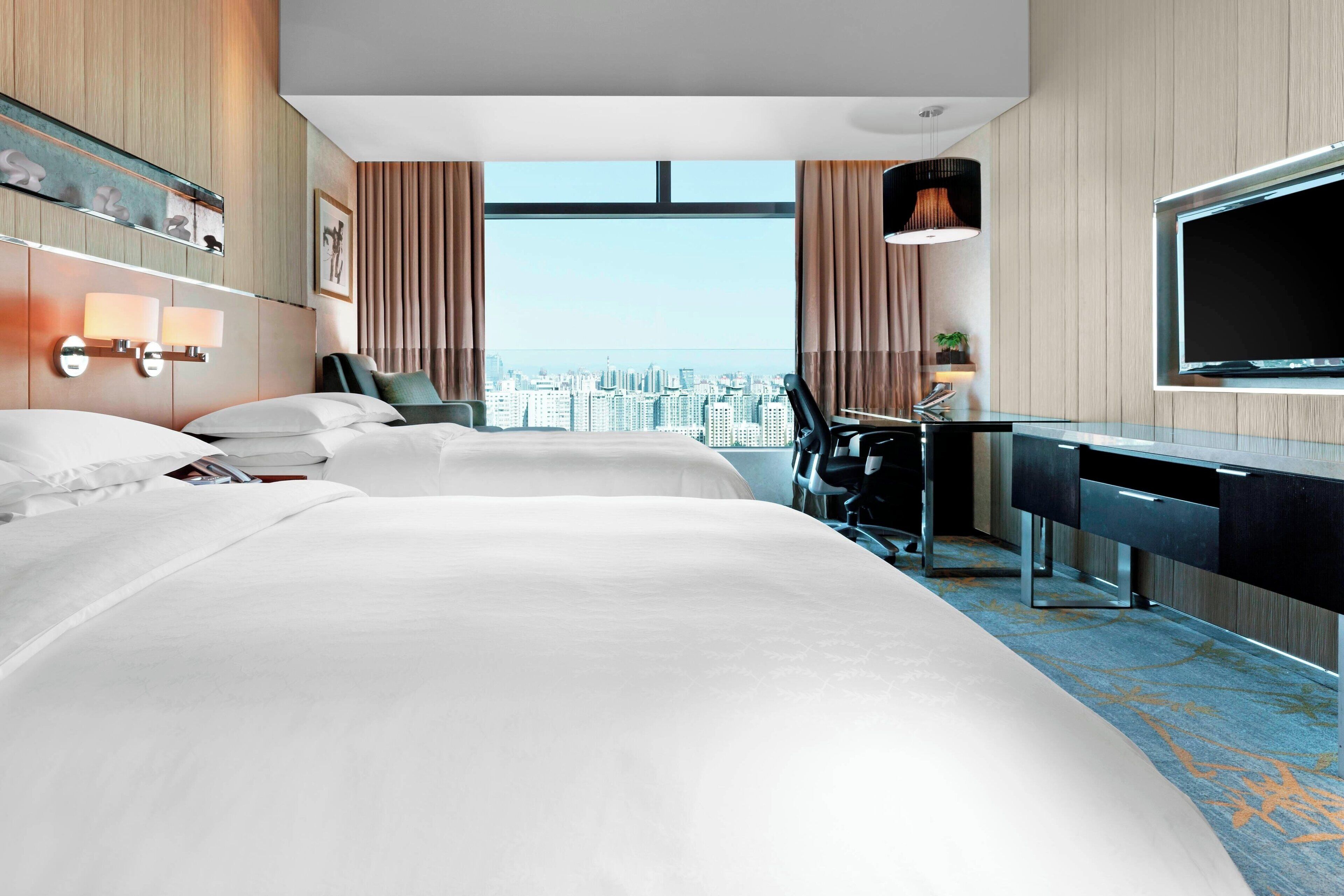 Hypo-allergenic bedding, down comforters, minibar, in-room safe