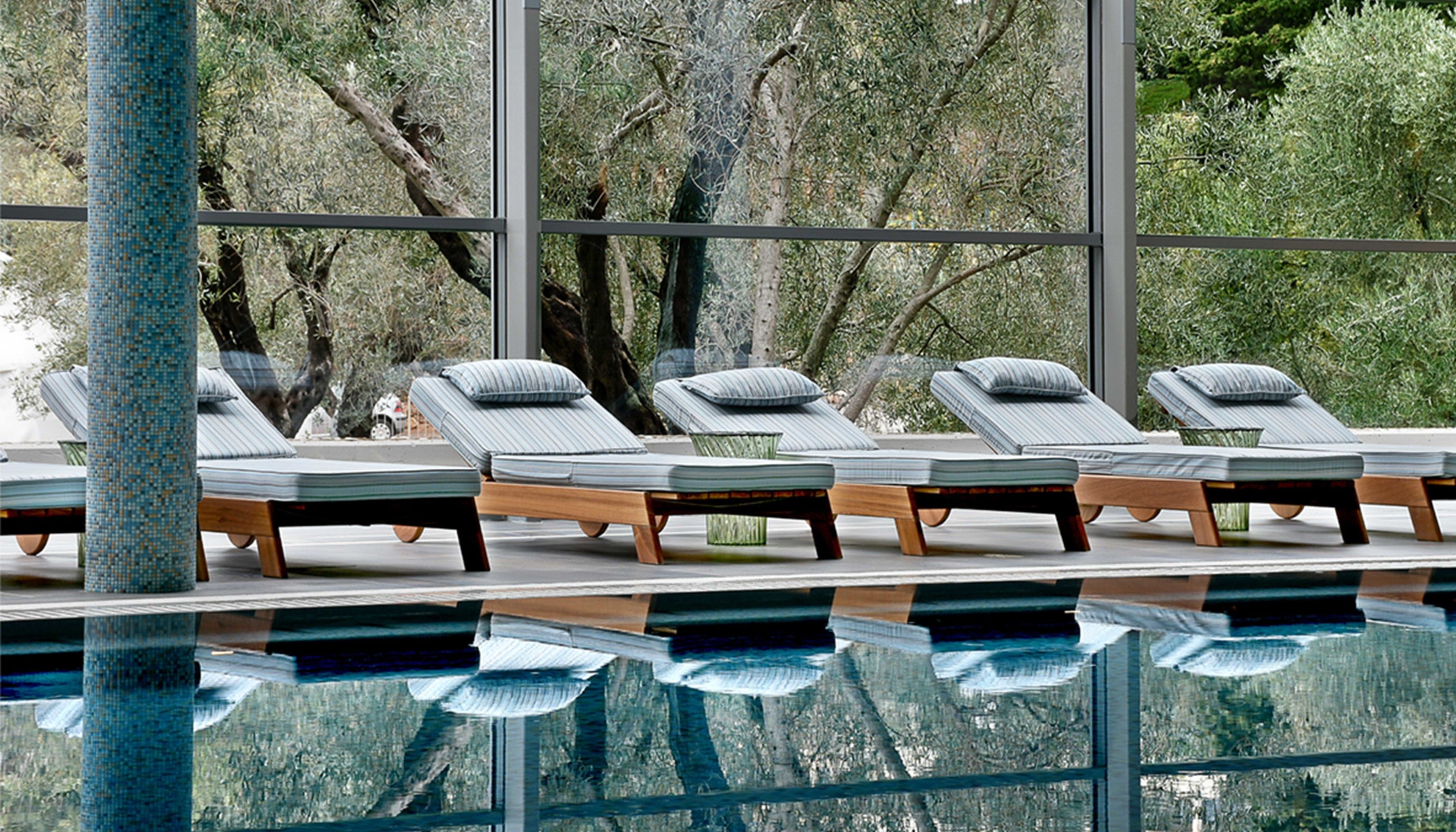 indoor pool, seasonal outdoor pool, pool umbrellas, pool loungers